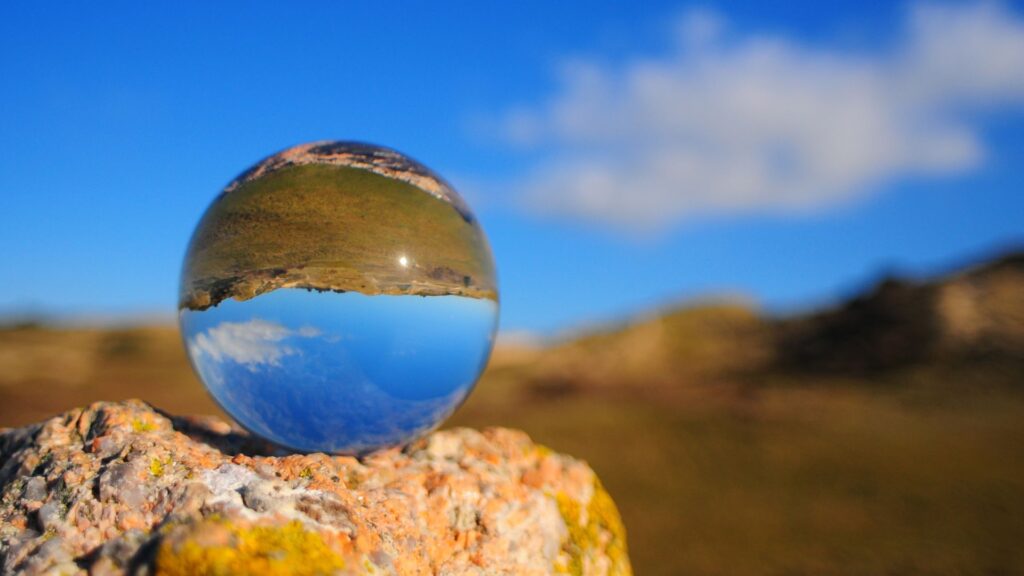 The balcony, the glass ball and the hawk